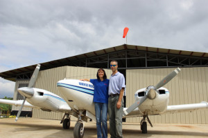 Dwayne and Wendy Harris in front of Luzon hangar