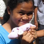 Joanne-sponsored student with new toy