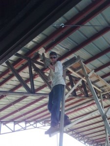 Andriy welding on the roof