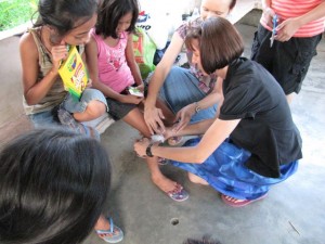 Placing the poultice during charcoal demo