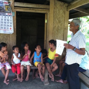 Bible worker, Simeon giving Bible study starting with kids