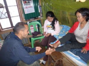 Briane with patient in Tinoc that was healed