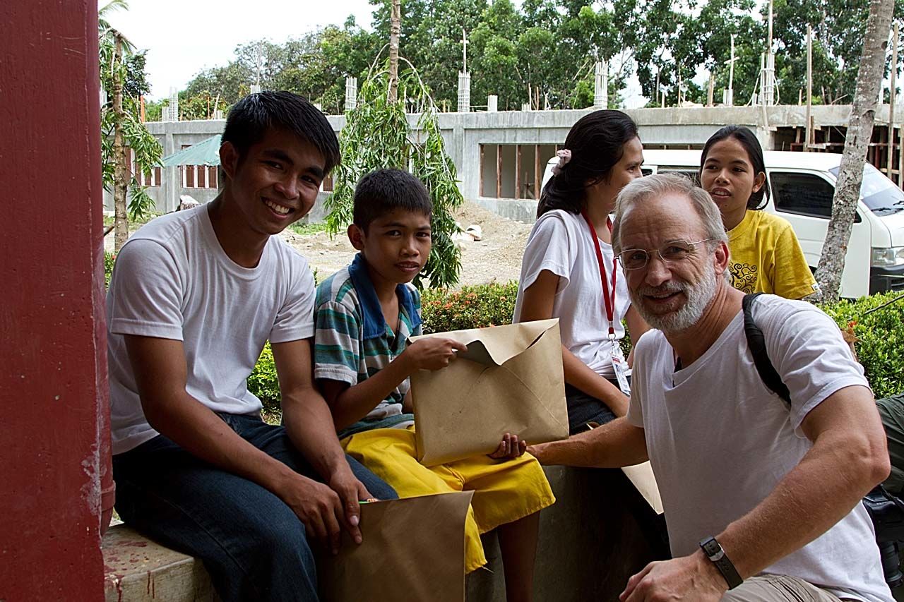 Dr. Norbert with students