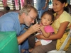 Norbert assessing little girl's ear