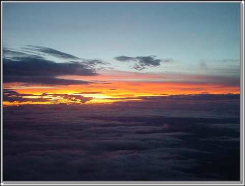 Sunrise over a sea of clouds above the jungles and savannahs of Venezuela